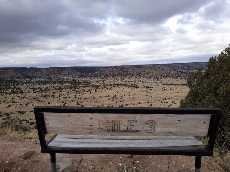 Bench marker at mile three of the Black Mesa trail