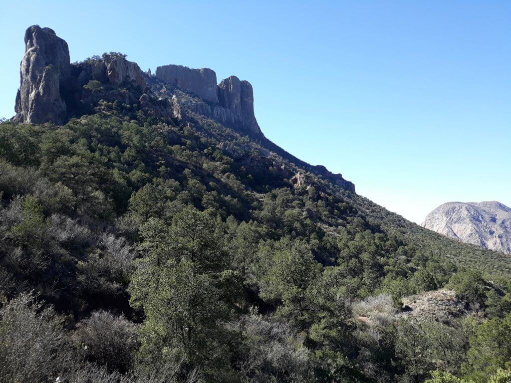 The iconic Casa Grande rock formation overshadowing the saddle